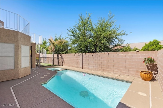 283 Grand Olympia Dr, Henderson, NV 89012 - view of swimming pool with fence and a pool with connected hot tub