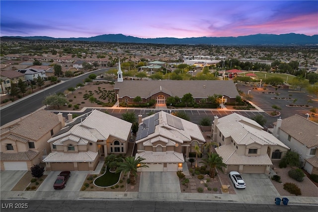 283 Grand Olympia Dr, Henderson, NV 89012 - aerial view of residential area featuring a mountain backdrop