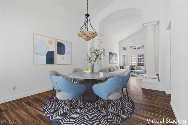 283 Grand Olympia Dr, Henderson, NV 89012 - dining area featuring decorative columns, wood finished floors, baseboards, and high vaulted ceiling