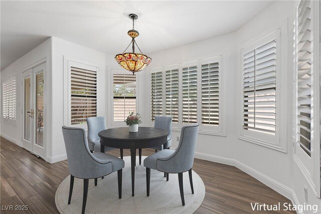 283 Grand Olympia Dr, Henderson, NV 89012 - dining area with dark wood finished floors and baseboards
