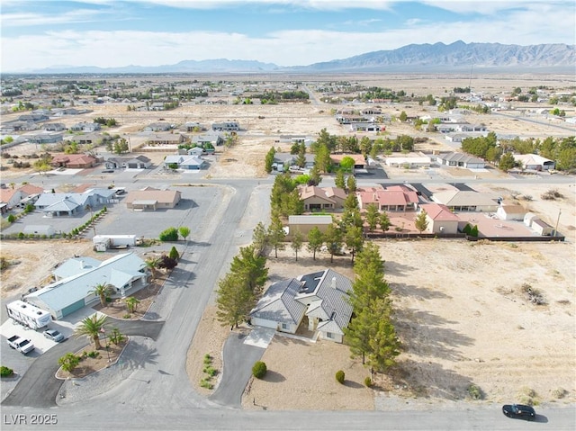 151 Hornet St, Pahrump, NV 89048 - aerial view of residential area featuring a mountain backdrop and a desert landscape