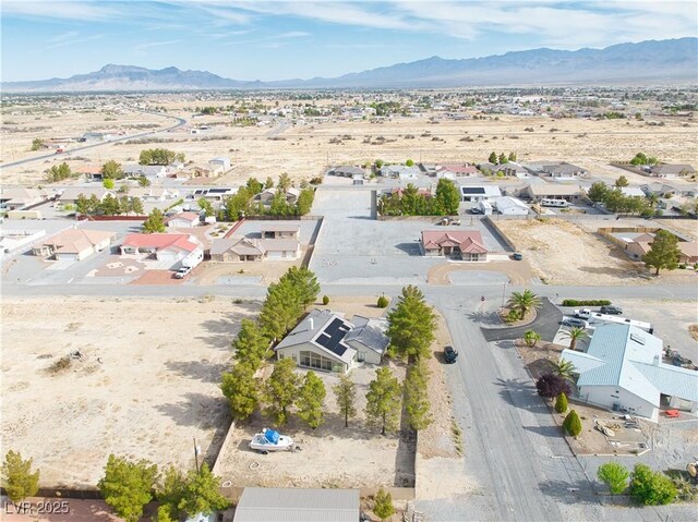 151 Hornet St, Pahrump, NV 89048 - aerial view of residential area with a desert landscape and a mountain backdrop