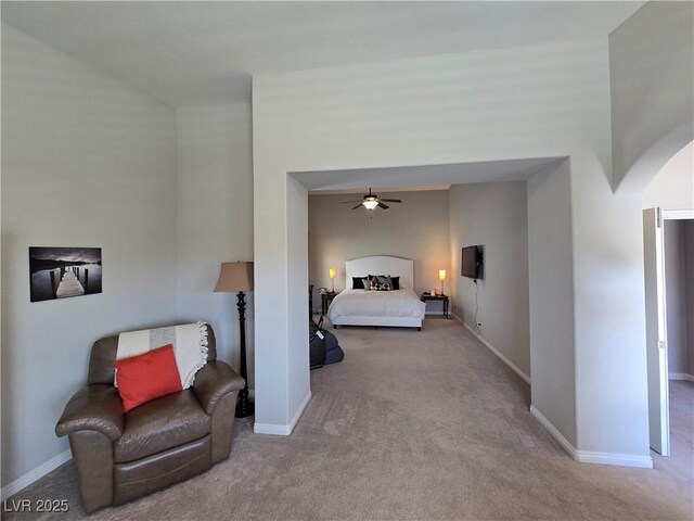 8303 Saddleback Ledge Ave, Las Vegas, NV 89147 - carpeted bedroom with arched walkways and baseboards