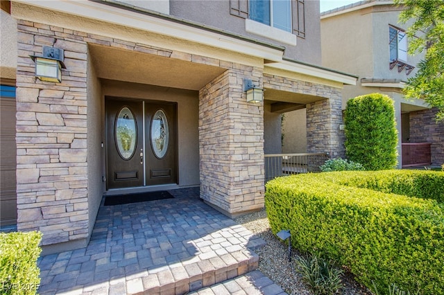8303 Saddleback Ledge Ave, Las Vegas, NV 89147 - entrance to property featuring stucco siding and stone siding