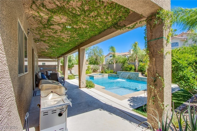 8303 Saddleback Ledge Ave, Las Vegas, NV 89147 - view of pool featuring a fenced backyard, a patio area, area for grilling, and a pool with connected hot tub