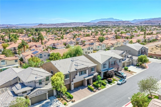 8303 Saddleback Ledge Ave, Las Vegas, NV 89147 - aerial perspective of suburban area with a mountainous background