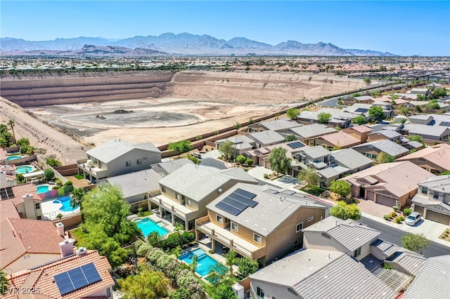 8303 Saddleback Ledge Ave, Las Vegas, NV 89147 - aerial view of residential area with a mountain backdrop