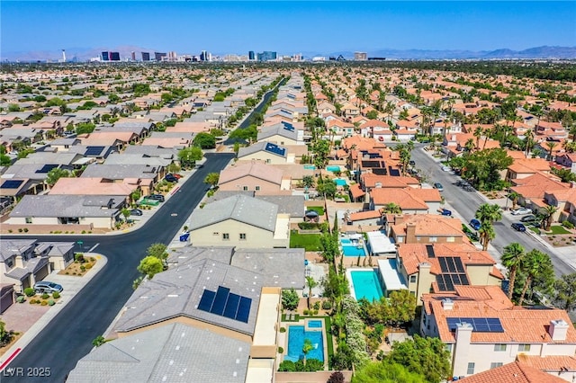 8303 Saddleback Ledge Ave, Las Vegas, NV 89147 - aerial perspective of suburban area with a pool