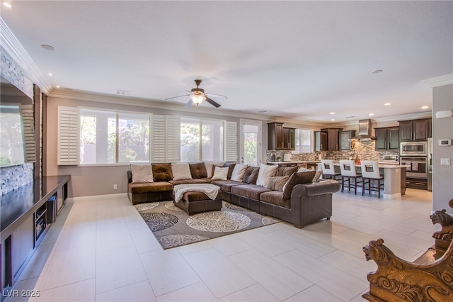 8303 Saddleback Ledge Ave, Las Vegas, NV 89147 - living area featuring ornamental molding, a ceiling fan, and recessed lighting