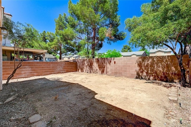 view of yard featuring a fenced backyard and a patio