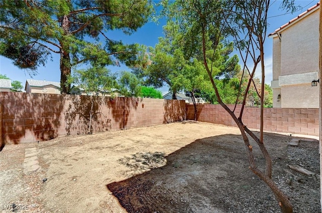view of yard featuring a fenced backyard and a patio
