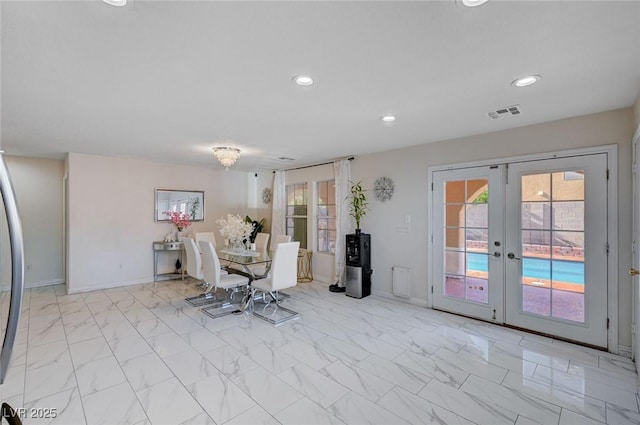 dining room with a wealth of natural light, french doors, visible vents, and recessed lighting