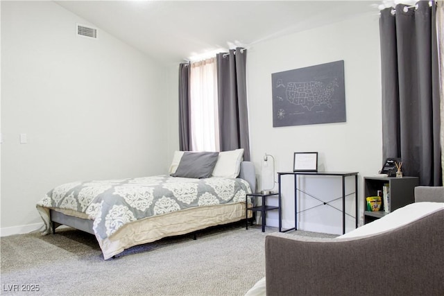 6198 Pinewood Ave, Las Vegas, NV 89103 - carpeted bedroom with lofted ceiling, visible vents, and baseboards
