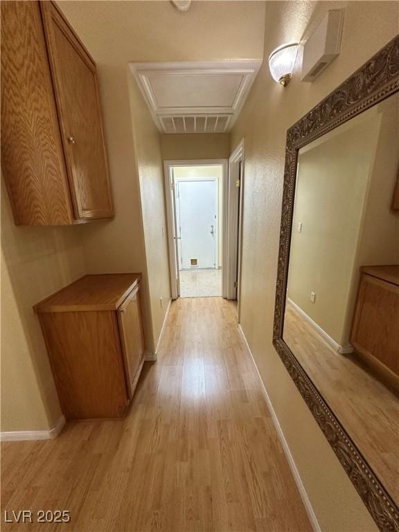 4484 Warbonnet Way, Las Vegas, NV 89147 - hallway with baseboards, light wood-style floors, and attic access