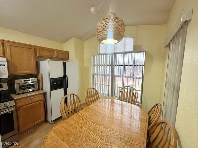 4484 Warbonnet Way, Las Vegas, NV 89147 - dining area with a toaster and light wood-style floors