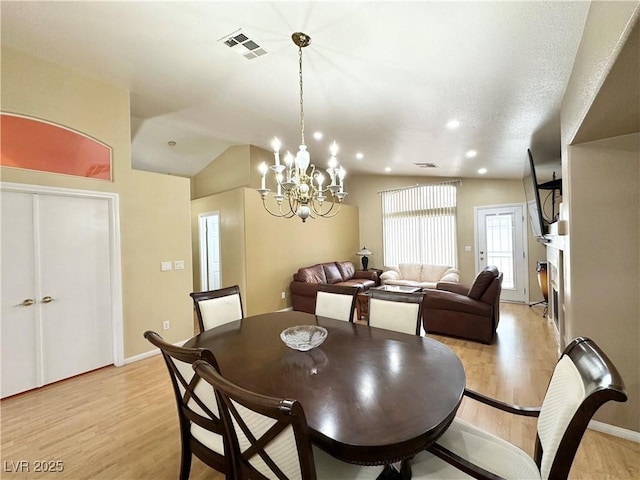 4484 Warbonnet Way, Las Vegas, NV 89147 - dining room featuring light wood finished floors, an inviting chandelier, visible vents, baseboards, and recessed lighting