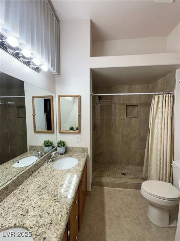 4484 Warbonnet Way, Las Vegas, NV 89147 - full bath featuring tile patterned floors, vanity, toilet, and a tile shower