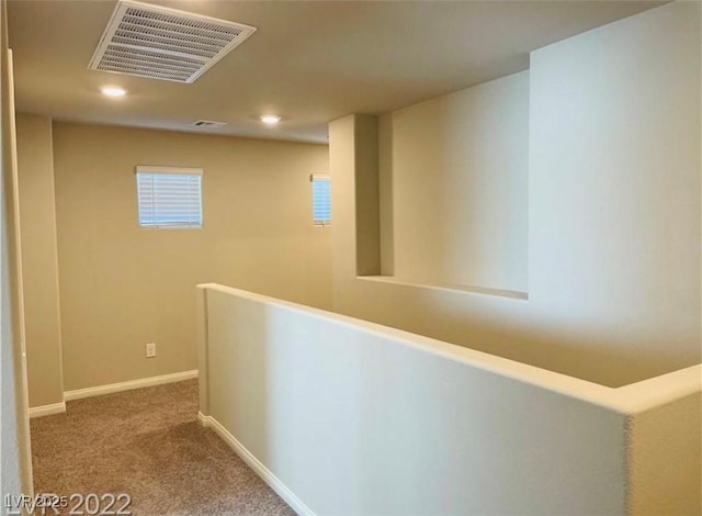 7892 W Shelbourne Ave, Las Vegas, NV 89113 - hall with carpet flooring, baseboards, visible vents, recessed lighting, and an upstairs landing