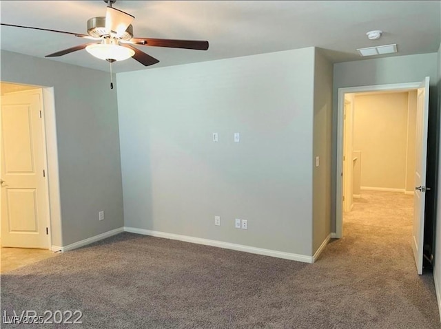7892 W Shelbourne Ave, Las Vegas, NV 89113 - unfurnished room with light carpet, a ceiling fan, visible vents, and baseboards