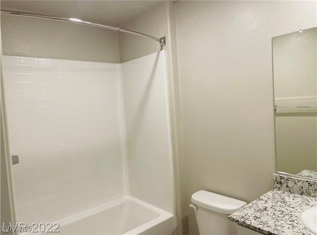 7892 W Shelbourne Ave, Las Vegas, NV 89113 - bathroom featuring bathing tub / shower combination, vanity, and toilet