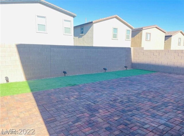 7892 W Shelbourne Ave, Las Vegas, NV 89113 - view of patio / terrace featuring a fenced backyard