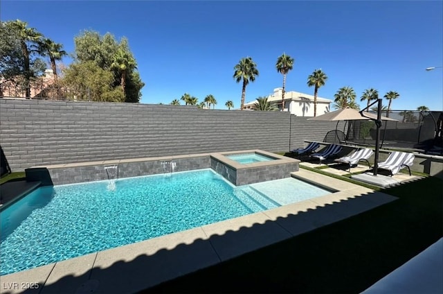 2715 Twin Palms Cir, Las Vegas, NV 89117 - view of pool featuring an in-ground hot tub and a fenced backyard