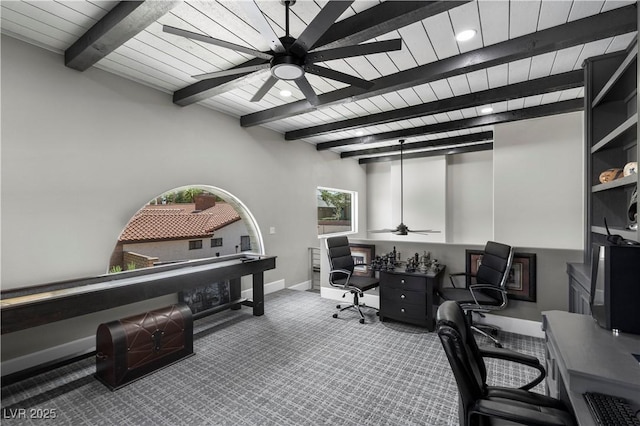 office area with baseboards, a ceiling fan, beam ceiling, and carpet