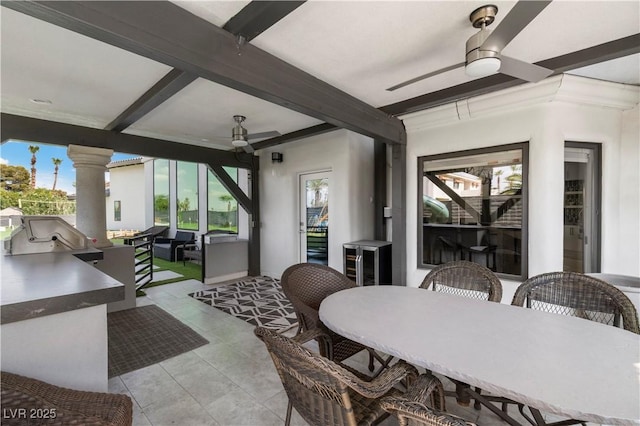 2715 Twin Palms Cir, Las Vegas, NV 89117 - view of patio / terrace with a ceiling fan, an outdoor kitchen, outdoor dining space, and an outdoor living space