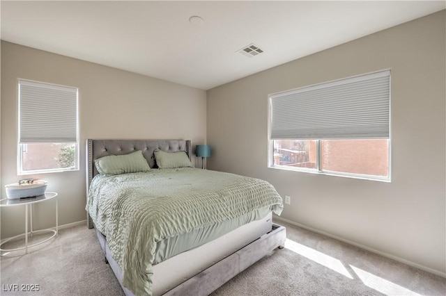 5593 Gold Mint Ln, Las Vegas, NV 89122 - bedroom featuring baseboards, visible vents, carpet, and multiple windows