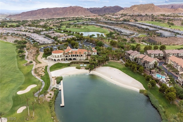 12 Tatahatso Point St, Henderson, NV 89011 - aerial view of property and surrounding area with a water and mountain view, a golf club, and nearby suburban area