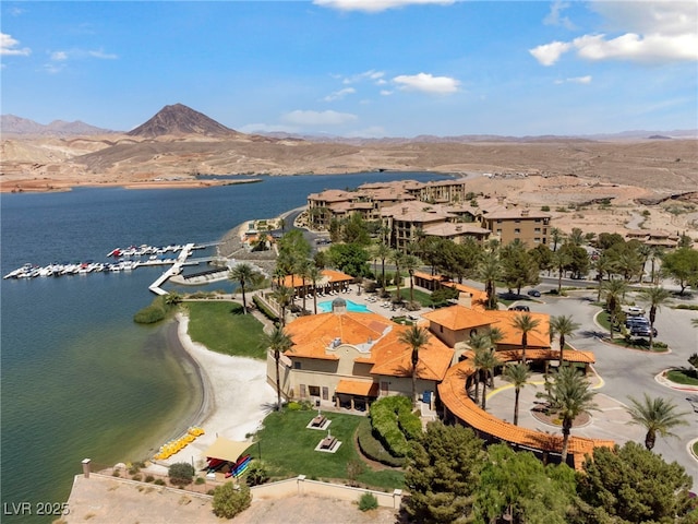 bird's eye view with a water and mountain view