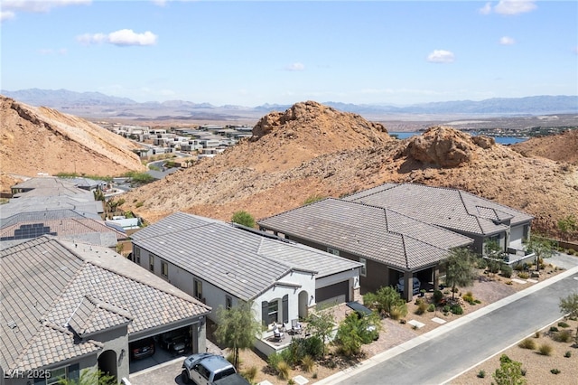 bird's eye view with a mountain view