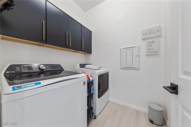 12 Tatahatso Point St, Henderson, NV 89011 - washroom featuring cabinet space, washing machine and dryer, baseboards, and wood finish floors