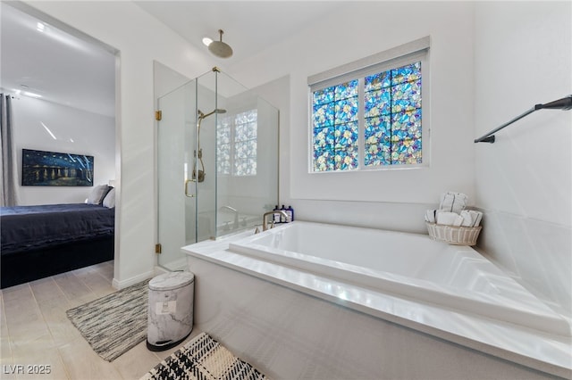 12 Tatahatso Point St, Henderson, NV 89011 - ensuite bathroom featuring a stall shower and a bath