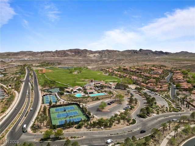 12 Tatahatso Point St, Henderson, NV 89011 - aerial overview of property's location with a mountainous background and a golf club