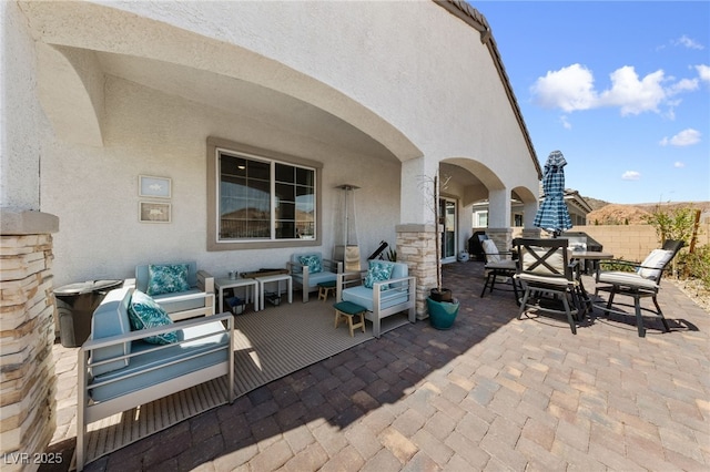 12 Tatahatso Point St, Henderson, NV 89011 - view of patio / terrace with outdoor lounge area and outdoor dining space