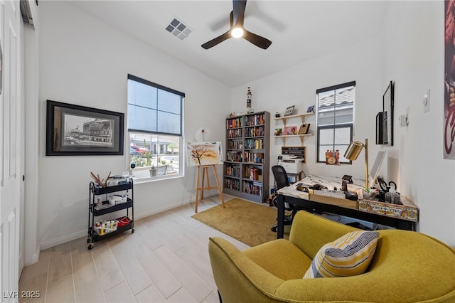 12 Tatahatso Point St, Henderson, NV 89011 - office featuring wood finished floors, a ceiling fan, and baseboards