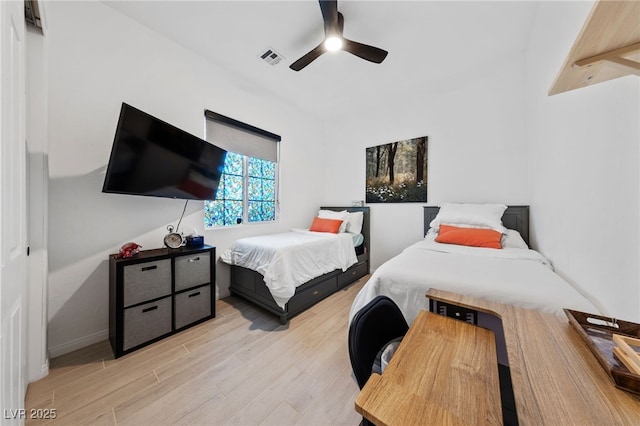 12 Tatahatso Point St, Henderson, NV 89011 - bedroom featuring light wood finished floors and a ceiling fan