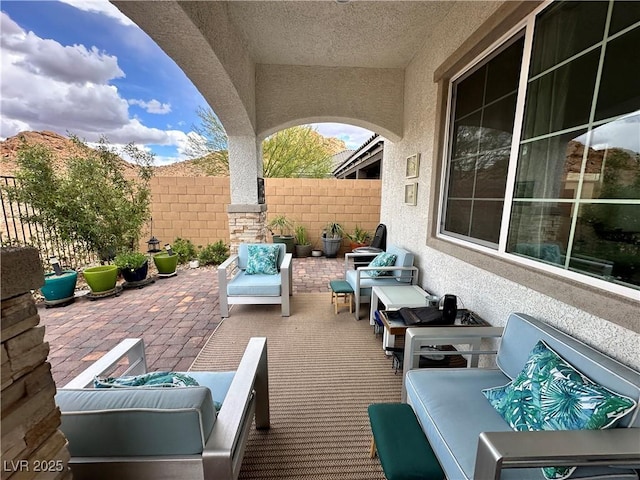 12 Tatahatso Point St, Henderson, NV 89011 - view of patio featuring an outdoor hangout area