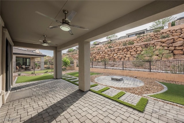 view of patio featuring ceiling fan and a fenced backyard