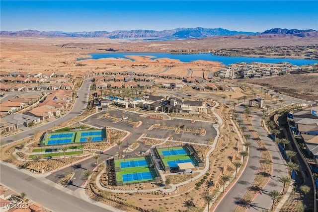 bird's eye view with a residential view and a water and mountain view