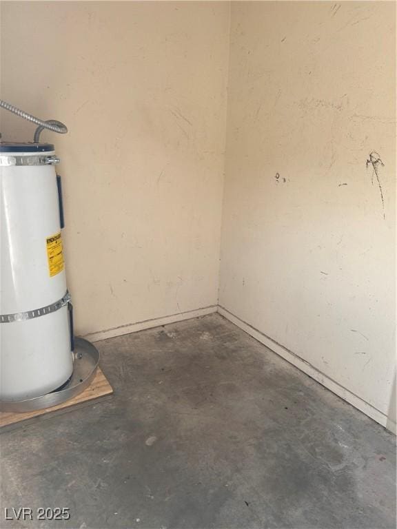 garage with strapped water heater