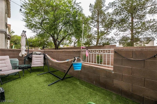 view of yard with fence