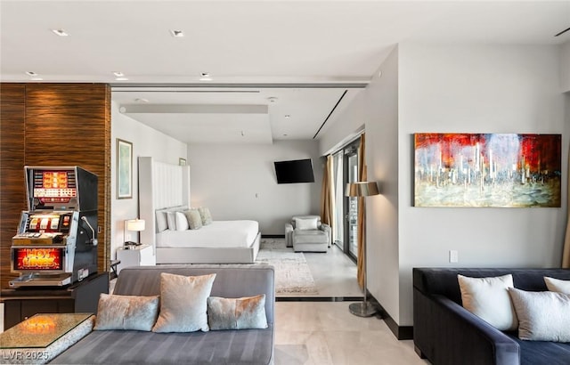 bedroom featuring baseboards