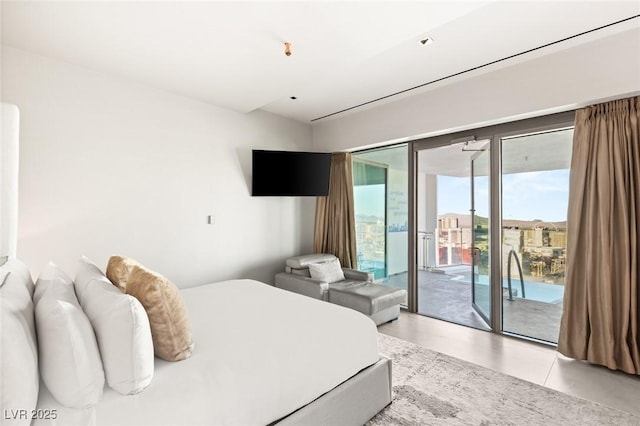 bedroom with access to outside
