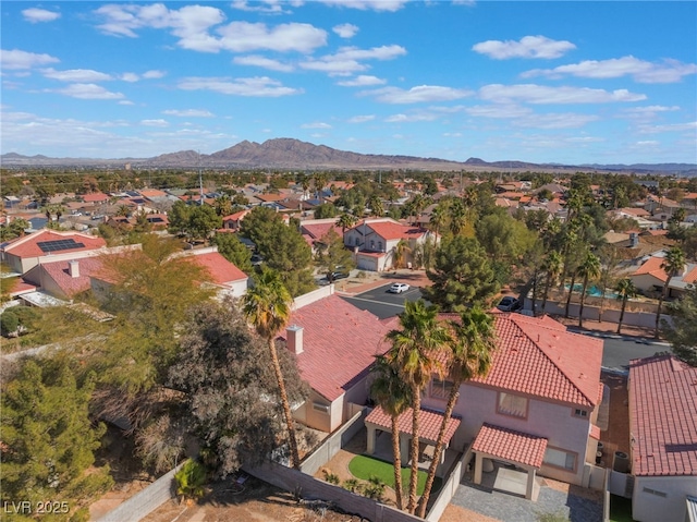 aerial view with a mountain view and a residential view