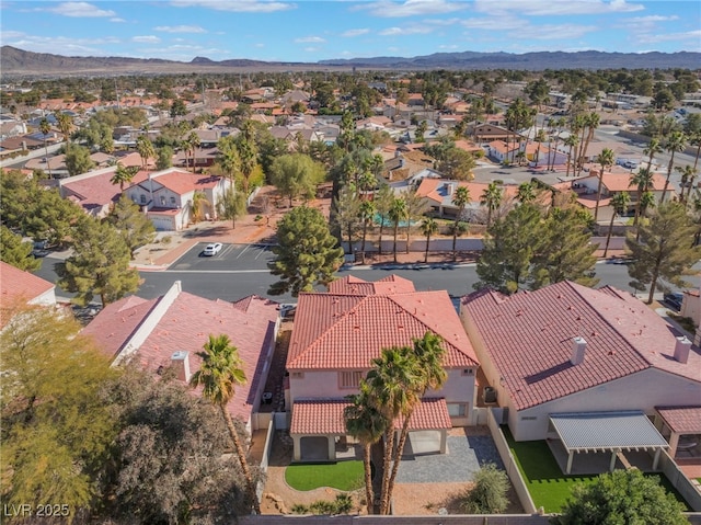 aerial view with a mountain view and a residential view