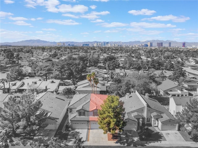 bird's eye view featuring a residential view and a mountain view