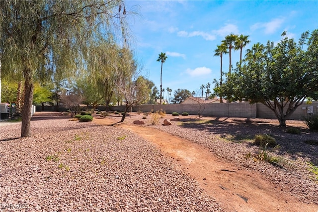 view of yard featuring fence
