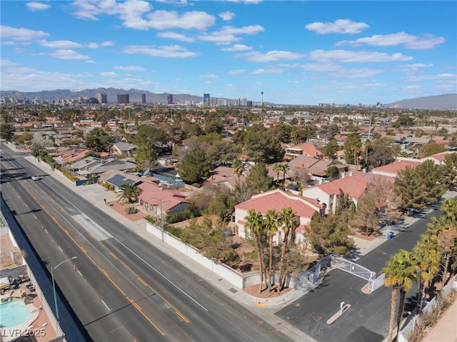 drone / aerial view featuring a mountain view and a residential view